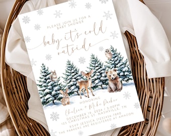 May include: A white baby shower invitation with a winter woodland theme. The invitation features a snowy forest scene with a deer, a bear, an owl, and a squirrel. The text on the invitation reads "baby it's cold outside" and includes the names Chelsee and Mike Parker, the date and time of the shower, and the address.