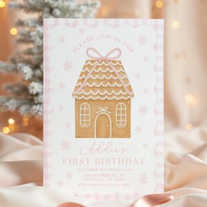 May include: A pink and white invitation card with a gingerbread house illustration. The card features the text "Please join us for Addie's First Birthday" and event details. The background has a pink gingham pattern and snowflake accents.