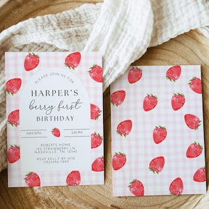 May include: Pink and white gingham patterned invitation with a strawberry design. The invitation says "Please join us for Harper's berry first birthday."  The invitation includes the date, time, address, and RSVP information.