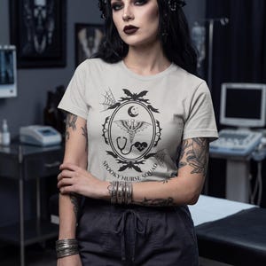 Spooky Nurse Squad Shirt Night Shift Design Healthcare Worker Gift Goth Aesthetic Tee Medical Staff Apparel Creepy Cute Style Nursing Student Present Halloween Costume Idea Alternative Fashion Top Dark Aesthetic Clothing Casual Wear Option