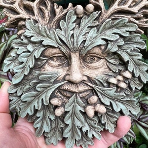 Green Man with antlers and acorns wall plaque