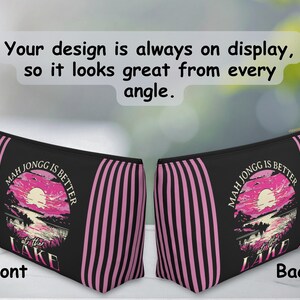 May include: Black zippered pouch with pink vertical stripes and a sunset graphic that reads "MAH JONGG IS BETTER at the LAKE." The text "Your design is always on display, so it looks great from every angle" is at the top.