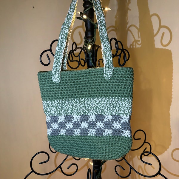 Crocheted bucket style bag.  Not too big, not too small, just right for all the things you need.  Fully lined with one pocket.