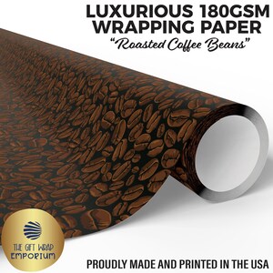 May include: A roll of luxurious wrapping paper with a pattern of roasted coffee beans. The paper is 180GSM and features the text "Roasted Coffee Beans". The Gift Wrap Emporium logo is visible. Proudly made and printed in the USA.