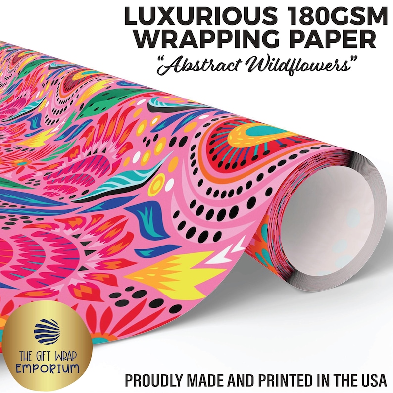 Puede incluir: Un rollo de papel de regalo lujoso con un vibrante dise&ntilde;o floral en rosa, amarillo, azul y rojo. El papel est&aacute; etiquetado como "Abstract Wildflowers" y es de 180GSM. El logotipo de The Gift Wrap Emporium es visible.