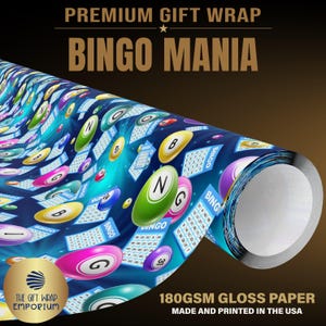 May include: A roll of gift wrap paper featuring a blue background with a pattern of colorful bingo balls and bingo cards. The text PREMIUM GIFT WRAP BINGO MANIA is at the top, and 180GSM GLOSS PAPER MADE AND PRINTED IN THE USA is at the bottom.