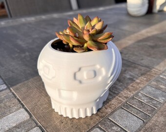 3D printed pixelated funky skull planter