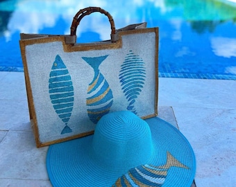 Peixe pintado à mão em um chapéu de verão