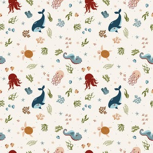 May include: A repeating pattern featuring various sea creatures and marine elements. The design includes red octopuses, blue whales, sea turtles, jellyfish, and coral, set against a cream-colored background with small blue dots.