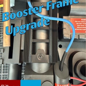 May include: A close-up of a black Booster Frame Upgrade prop with blue tubing and red warning labels. The text "Booster Frame Upgrade" is in blue, and the logos for Halloween Costumes and FUN.com are visible.