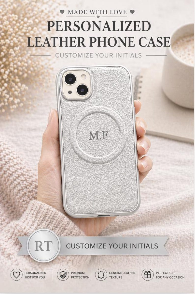 May include: A light gray leather phone case with the initials "M.F" embossed on the back. The case is personalized and features the text "CUSTOMIZE YOUR INITIALS". The case is designed for premium protection and has a genuine leather texture.