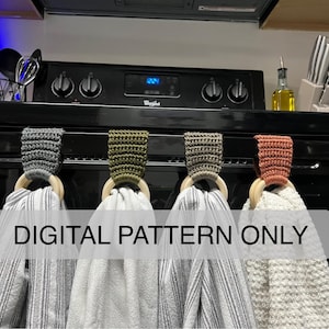 May include: Four crochet towel holders with wooden rings, each holding a different patterned kitchen towel. The crochet colours are grey, olive green, brown, and rust. The text "DIGITAL PATTERN ONLY" is across the image.