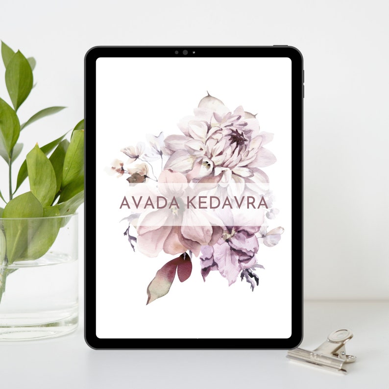 May include: A digital tablet screen displaying a watercolor painting of a bouquet of pink and purple flowers with the text "AVADA KEDAVRA" in the center.