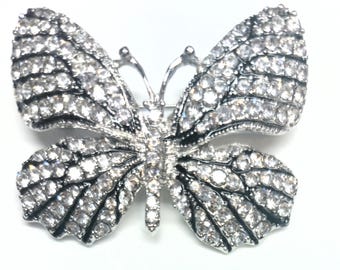 Schmetterling Brosche, Mid Century, klare Straßsteine auf schwarzem Untergrund