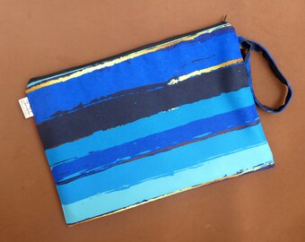 Blue and Gold Striped Bikini Bag, Stylish Beach Accessory, Travel-Ready, Waterproof Lining cosmetic pouch Zipper Closure, Unique Gift Idea