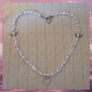 ¡Collar de corazón de cristal!