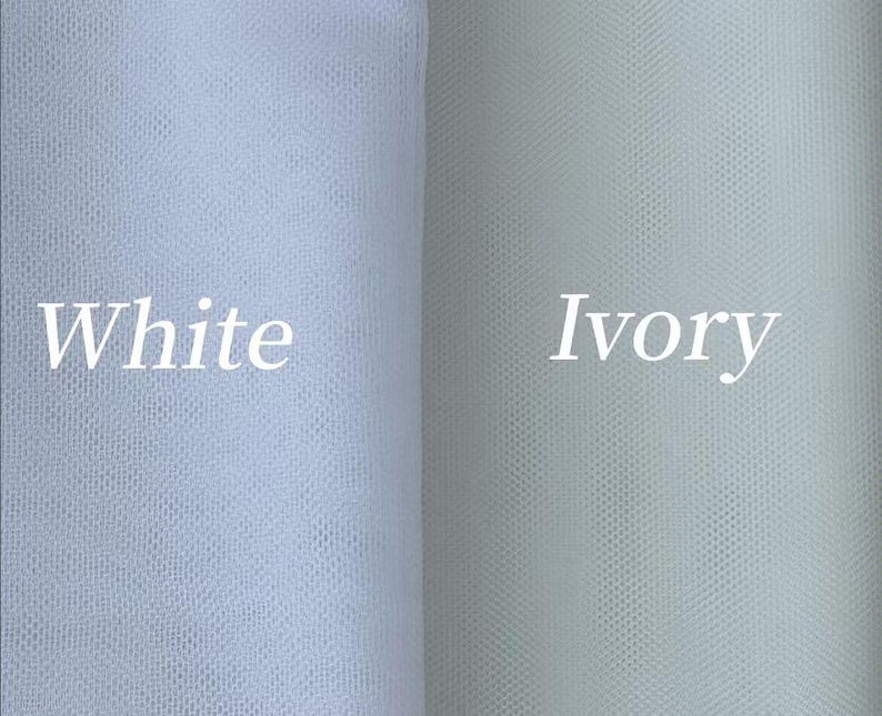 May include: A side-by-side comparison of two fine mesh fabrics. The left section is bright white with the text White overlaid, while the right section is a soft off-white shade with the text Ivory overlaid. Both fabrics feature a consistent, small-scale hexagonal netting pattern.