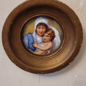Italian watercolor miniature of Madonna and child in round gesso frame woth gold finish