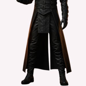 May include: A black leather outfit featuring a long coat with a belted waist and a split front, paired with matching leather pants and boots. The coat has decorative stitching and the outfit is designed with a gothic or steampunk aesthetic.