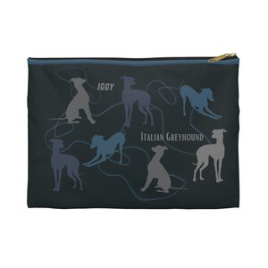 May include: A black zippered pouch with a dark blue trim. The pouch features a repeating pattern of grey, blue, and white silhouettes of Italian Greyhounds. The text "IGGY" and "ITALIAN GREYHOUND" are printed on the pouch.
