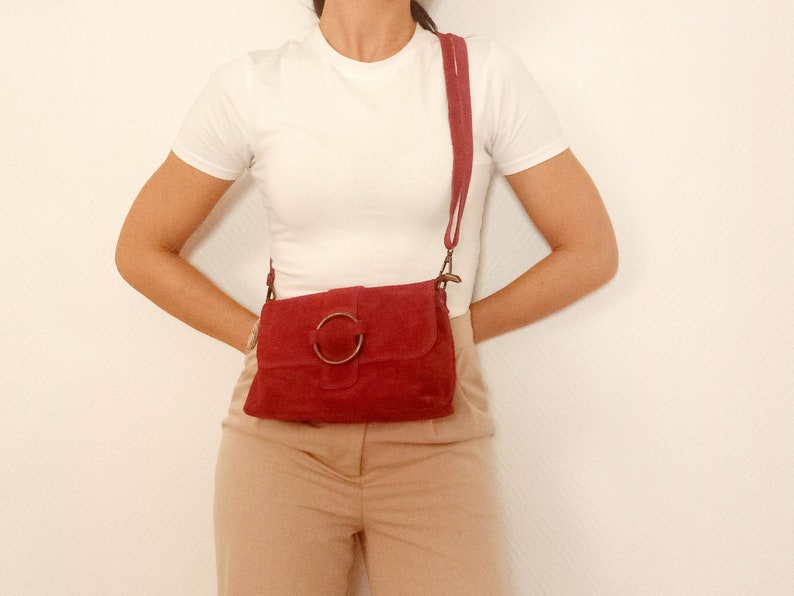 Leather, suede or suede bag, Cassiopeia in camel color and with matching strap. Matte steel metal finishes. image 7
