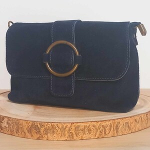 Leather, suede or suede bag, "Cassiopeia" in navy blue color and with matching strap. Matte steel metal finishes.