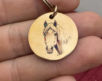 Key ring personalized with motif and writing as a gift or souvenir with animal pictures or baby pictures.