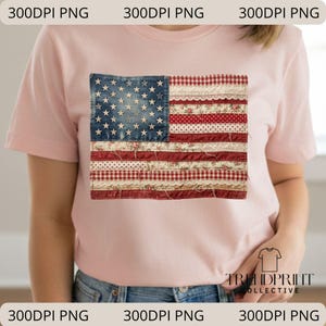 May include: A pale pink t-shirt with a patchwork American flag design. The flag features a denim blue field with white stars and red and white striped sections with floral and lace details. The shirt has the text "TRENDPRINT COLLECTIVE".