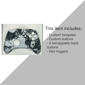 May include: A custom Xbox controller with a black and white faceplate featuring a wolf design. The controller has custom buttons and remappable back buttons. It also includes hair triggers.