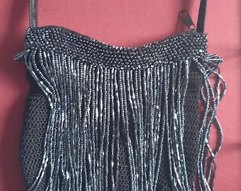 Bolso de mano azul oscuro con cuentas en caja original de Louis Vuitton