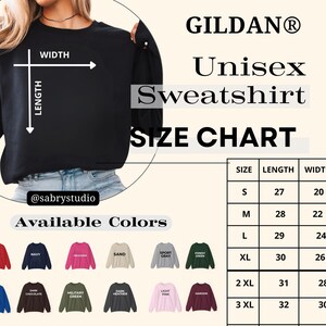 Op de afbeelding: Zwart unisex sweatshirt met maattabel en beschikbare kleuren. De maattabel toont afmetingen in centimeters: S (lengte 69 cm, breedte 51 cm), M (lengte 71 cm, breedte 56 cm), L (lengte 74 cm, breedte 61 cm), XL (lengte 76 cm, breedte 66 cm), 2XL (lengte 79 cm, breedte 71 cm), 3XL (lengte 81 cm, breedte 76 cm).