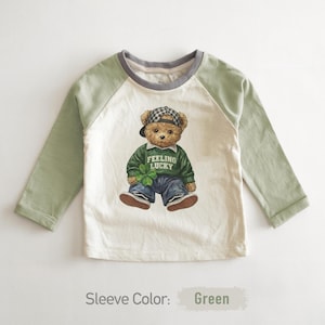 May include: A rustic wooden sign with the text "Welcome to our home" in white lettering. The sign features a distressed finish and a simple, inviting design, perfect for front door decor.