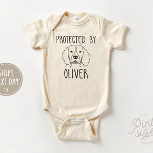 Protected By Dog Breed Onesie® - Cute Personalized Bodysuit - Natural Custom Baby Onesie®
