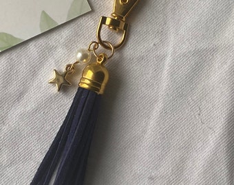 Carabiner, gold star bag charm/key ring, and NAVY BLUE pompom