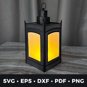 May include: A black paper lantern with a warm yellow glow. The lantern has a rectangular shape with arched windows and a decorative top. The bottom of the image displays the text "SVG • EPS • DXF • PDF • PNG".