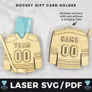 May include: Wooden hockey jersey gift card holder with a hockey stick and the text "TEAM 00". The design includes versions with and without a hanging hole. The text "HOCKEY GIFT CARD HOLDER" and "LASER SVG/PDF" are also visible.