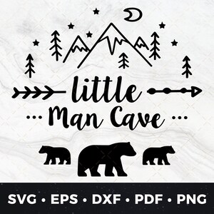 May include: Black and white graphic design with a mountain range, stars, a crescent moon, and trees. The text "little man cave" is written in a cursive font with arrows on either side. Three black bear silhouettes are at the bottom of the design.