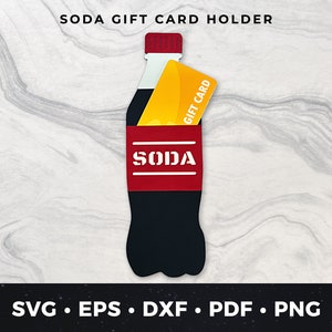 Puede incluir: Un tarjetero con forma de botella de refresco negro y rojo con la palabra "SODA" en blanco. Una tarjeta de regalo amarilla está insertada en el soporte. La parte superior de la botella es roja y el fondo es un patrón de mármol.