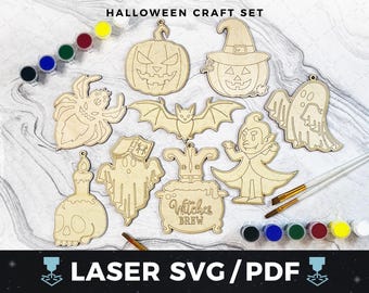 May include: A set of ten laser cut wooden Halloween craft ornaments. The ornaments include a bat, a ghost, a spider, a witch's cauldron, a vampire, a pumpkin, a candle, a ghost, and two pumpkins. The ornaments are ready to be painted.