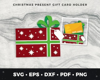May include: A red and green papercraft gift box with white stars and a green bow. The box is open to reveal a gift card with the text "Gift Card".