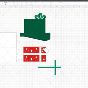 Puede incluir: Una plantilla imprimible para una caja de regalo de Navidad. La plantilla incluye una caja verde con un lazo, una caja roja con copos de nieve blancos y un sobre blanco con una l&iacute;nea discontinua para doblar.