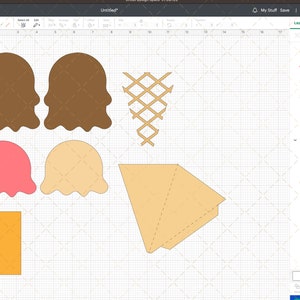 Peut inclure: Mod&egrave;le de conception num&eacute;rique pour un porte-carte cadeau en forme de cornet de glace imprimable. Le design comprend une boule de glace brune, rose et jaune, un cornet gaufr&eacute; et une base rectangulaire.
