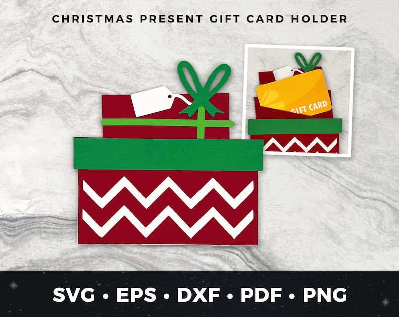 May include: A red and green Christmas present gift card holder with a white chevron pattern. The holder is shaped like a stack of presents with a green bow and a gift tag on top. The gift card holder says "Gift Card" on the front.