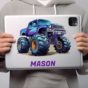 May include: A blue and purple monster truck with the name "MASON" printed below it. The truck has large tires and is cartoon-style.