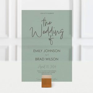 May include: A sage green wedding invitation with the text "JOIN US TO CELEBRATE the Wedding of EMILY JOHNSON and BRAD WILSON April 18, 2024 FIVE O'CLOCK IN THE EVENING O'CONNOR EVENT CENTER MENTWOOD, TN"