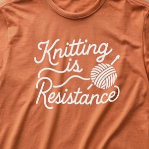 100% Cotton Knitting Is Resistance T-Shirt - Minimalist Yarn Graphic Protest-Inspired Tee | Artisan Screen Printed image 9