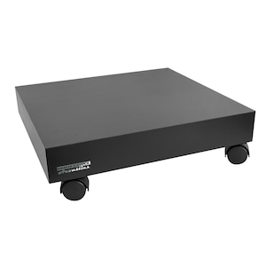 May include: A rectangular black platform with a smooth surface and four small black caster wheels attached to the bottom corners. The front side features a white logo with the text Butcher Block Acoustics printed in a stylized font.