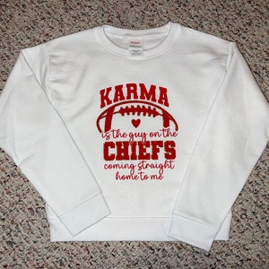 Karma is the guy on the Chiefs coming straight home to me Crewneck