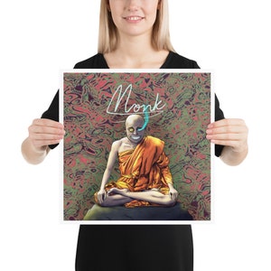 May include: A digital art print featuring a bald, smiling monk in a bright orange robe, sitting in a meditative pose on a rock. The background is a swirling pattern of green and red. The word "Monk" is written in white cursive above the monk.