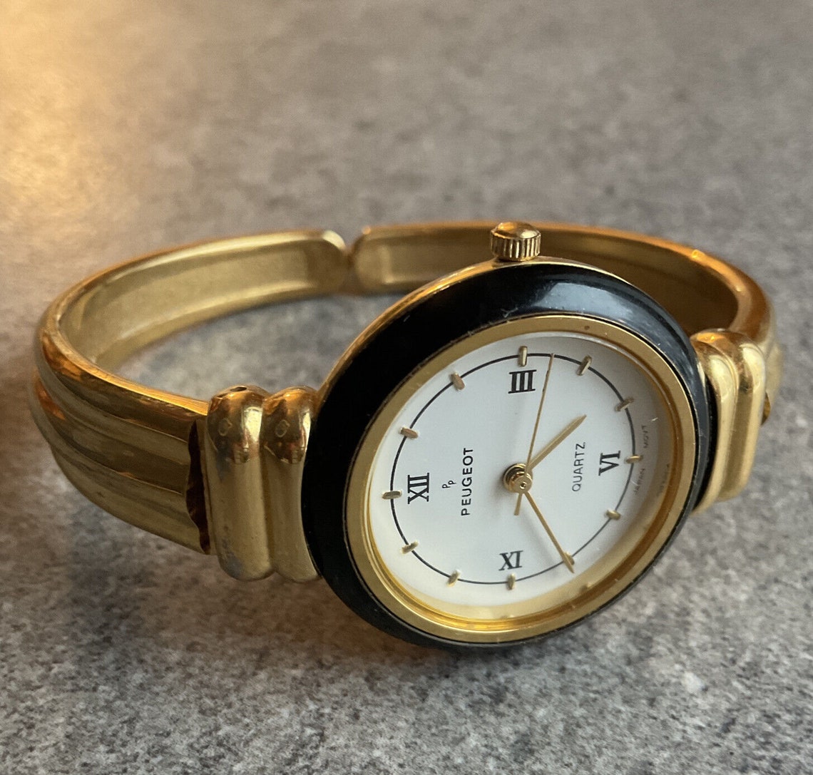 Two Vintage Peugeot Watches a Mother of Pearl Dial Diamond Gold Tone